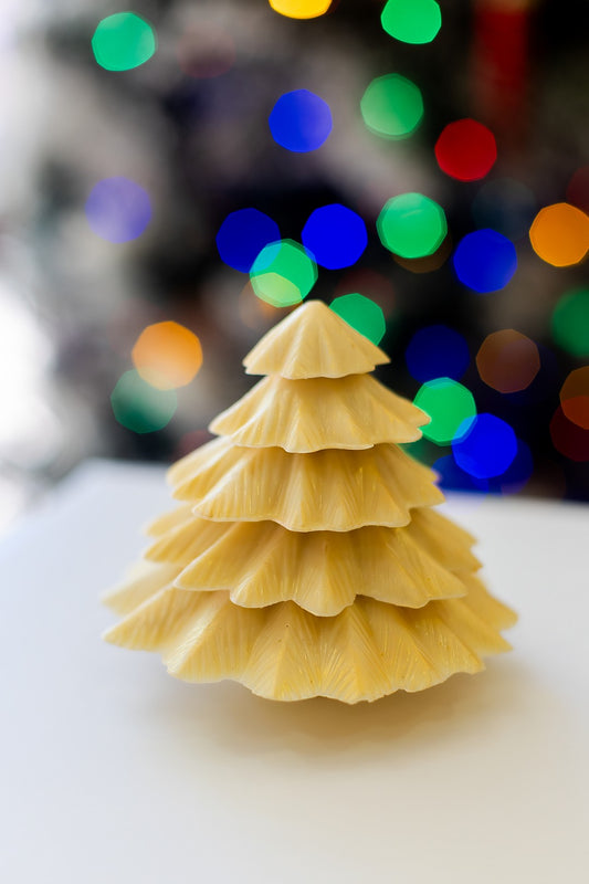 Handcrafted chocolate Christmas tree with five stacked layers of chocolate, designed as a festive holiday chocolate gift.