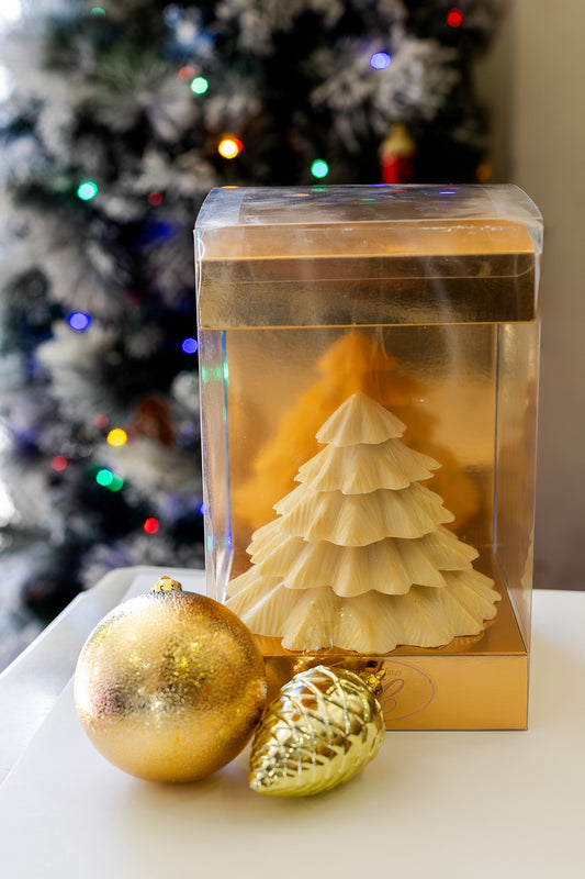 Handcrafted chocolate Christmas tree with five stacked layers of chocolate, designed as a festive holiday chocolate gift.