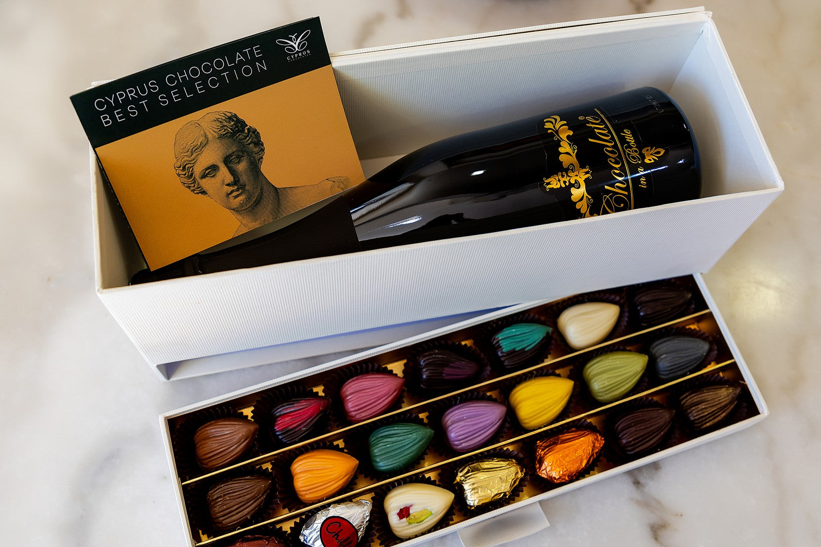 Luxury gift box featuring Exclusive Chocolate Wine Box set with 21 chocolate petals, perfect for celebrations, made in Cyprus