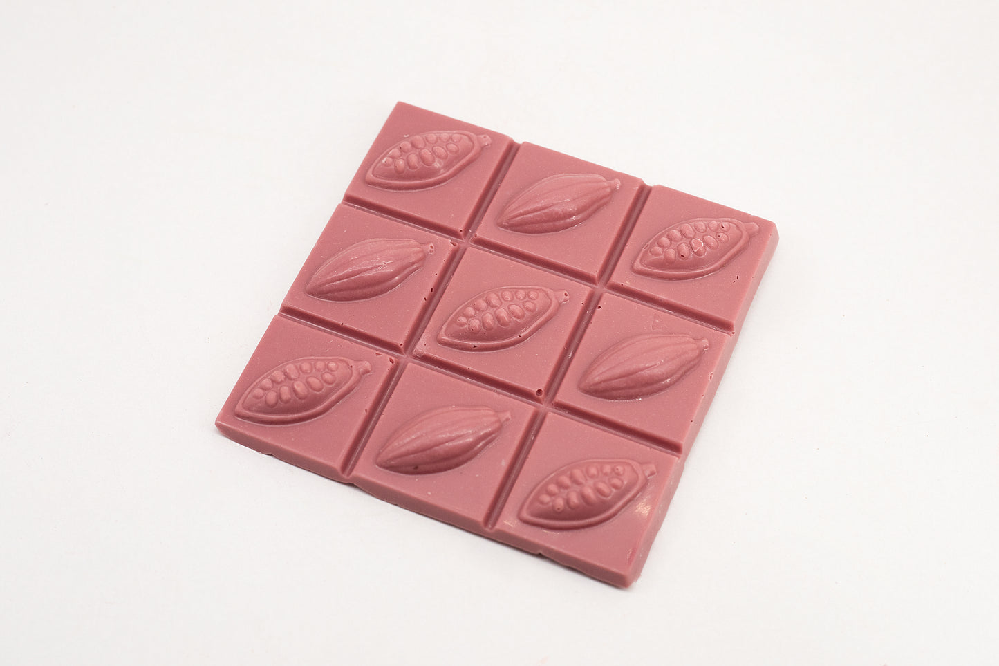 Premium ruby chocolate bar with natural berry notes and smooth, creamy finish.