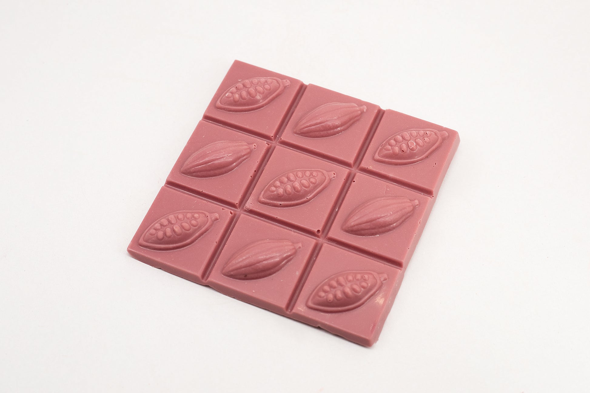 Premium ruby chocolate bar with natural berry notes and smooth, creamy finish.